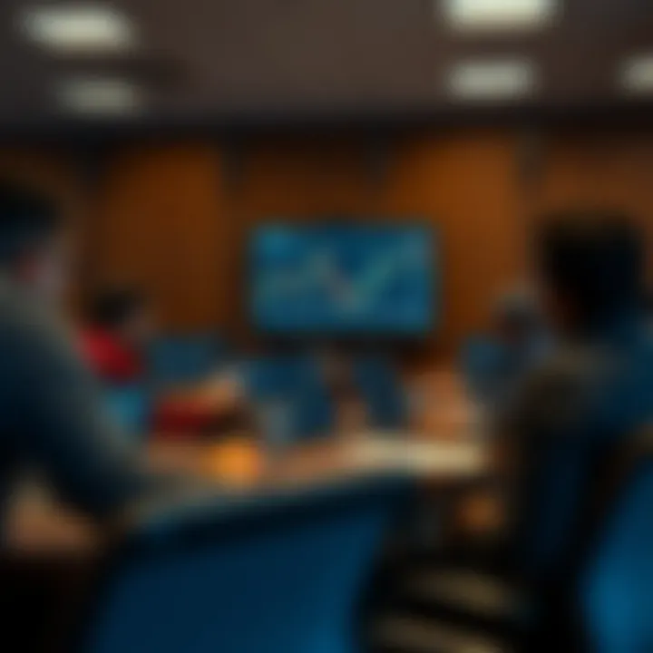 Classroom setting with students engaged in forex trading lessons on laptops