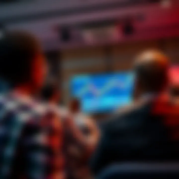 Forex trading seminar attendees focusing on a digital currency chart presentation in Durban